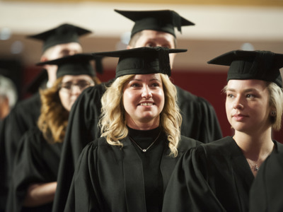 graduates queuing