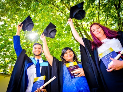 three graduates with awards