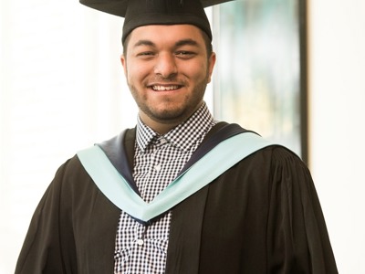 graduate smiling