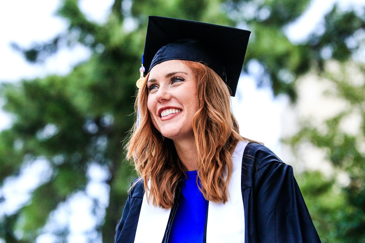 graduate smiling