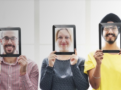 3 people smiling