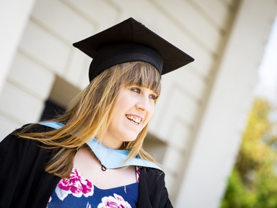 graduate smiling