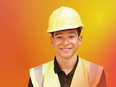 person in hard hat smiling